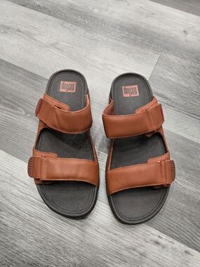 FitFlop Men's Gogh Moc Adjustable Strap Slide Sandals in the Dark Tan color